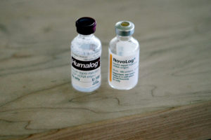 Two bottles of insulin are seen at the home of Jack Christensen. Humalog, left, costs about $400 a bottle and Novolog, right, costs about $300 a bottle, his parents said. Jack uses three to four bottles of insulin a month. Without insurance, the family estimates they would have to pay between $15,000 to $30,000 a year for insulin.