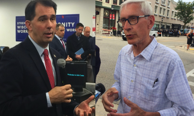 Evers, Walker spar over pre-existing condition protections