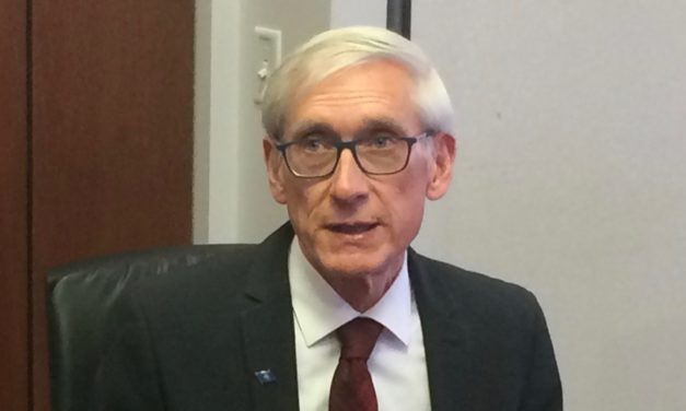 Evers threatens lawsuit over Title X changes